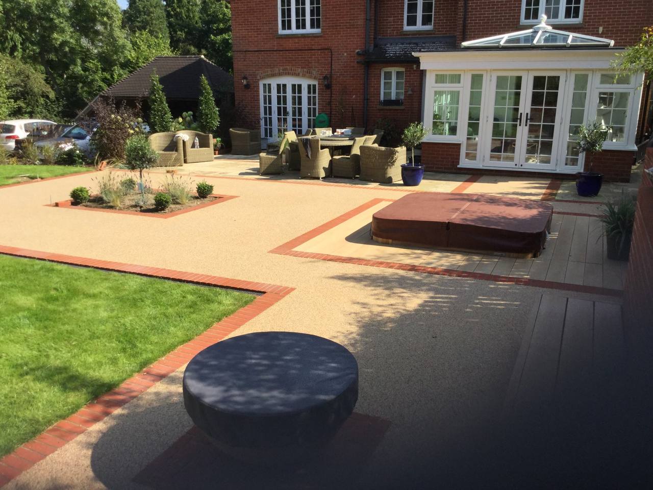 This is a photo of a Resin bound patio carried out in Cheshire. All works done by Bury Resin Driveways Cheshire