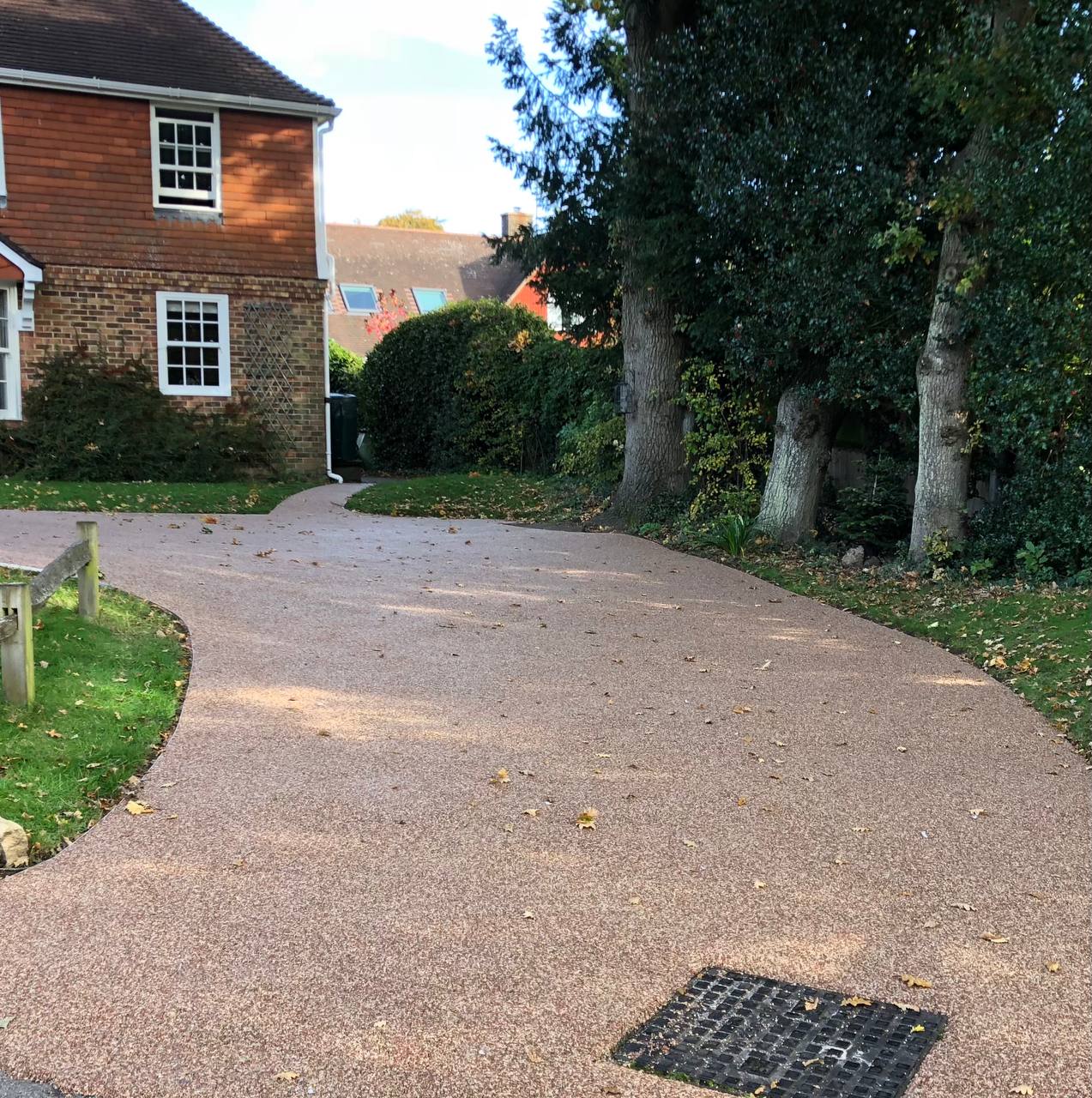 This is a photo of a Resin bound driveway carried out in a district of Cheshire. All works done by Resin Driveways Cheshire