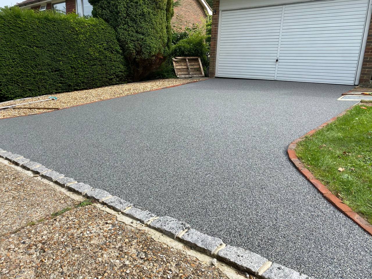 This is a photo of a new resin bound driveway carried out in Cheshire. All works done by Resin Driveways Cheshire